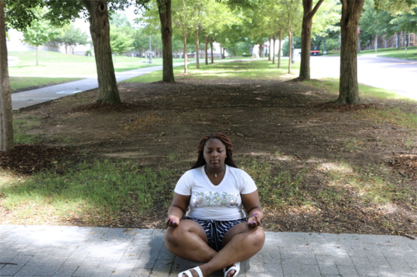 aaliyah-davis-mediates The author, Aaliyah Davis, meditating in a park