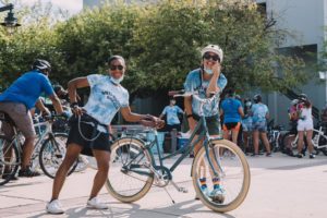 Kim Seay and Bea Apple on bikes