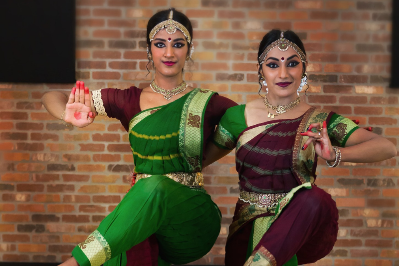 Featured KIFA Grand Opening two female dancers in traditional Indian attire